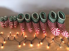 Everyone in your family can enjoy a pair of these Winter Elf Slippers this Christmas time!!  For the price of one pattern you can make these slippers to suit a whole range of sizes!  Baby - Up to size 5 1/2 Toddler - Size 6-12 Childs - Size 1-3 Ladies - Size 4-7 Mens - Size 7-12 Buy this pattern today to make these adorable comfortable slippers for your family in time for Christmas!!  Stitches you will need to know, Knit, Purl, Knit 2 together, Purl 2 together and Slip Slip Knit! Winter Elf, Elf Slippers, Create Kids Couture, Slipper Pattern, Knit Slippers, Christmas Knit, Christmas Slippers, Children Christmas, Comfortable Slippers