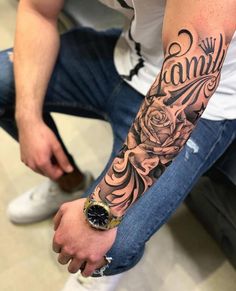 a man with a rose tattoo on his arm