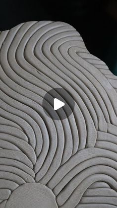 a close up view of a mattress with wavy lines on it