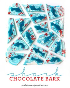 chocolate bark with blue and red sprinkles on it, in front of a white background