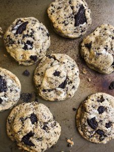 chocolate chip cookies on a baking sheet ready to be eaten