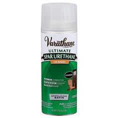 the spray can is white and green with brown trim on it, which says varattone ultimate