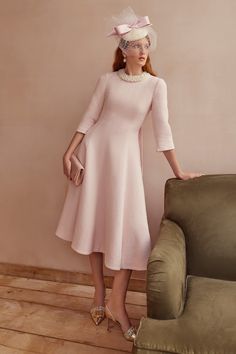 Our beautiful pearl-effect collarettes are hand-beaded onto an ivory silk organza mount. Tied at the back with an ultra feminine baby pink double-sided silk satin ribbon. A glamorous addition to our Lucy Midi Dress in Pink Metallic Tweed, or styled simply onto a round neck cashmere sweater. The ribbons can be made in bespoke silk or velvet colours to complement your dress, please contact us for more information. ---- Beads: 100% Acrylic- Ribbon: 100% Silk --- - One Size Luxury Pink Lace Work Dress, Luxury Evening Dresses With Pearl Buttons, Satin Ribbon Work On Dress, Luxury Elegant Dresses With Pearl Buttons, Princess Midi Dress, Ivory Dress Outfit, Suzannah London, Classic Fashion Pieces, Convention Outfits