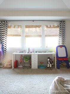 a child's playroom with toys in it