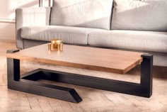 a coffee table sitting on top of a wooden floor