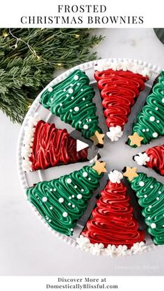 christmas brownies decorated with red, green and white icing in the shape of trees