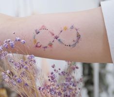 a person with a tattoo on their arm