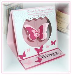 a card with a pink butterfly on it