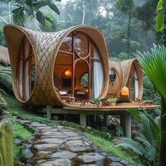 an unusual house in the middle of a forest