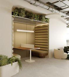 an office with plants growing on the wall