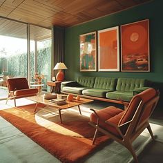 a living room filled with green furniture and orange accents on the walls, along with large windows