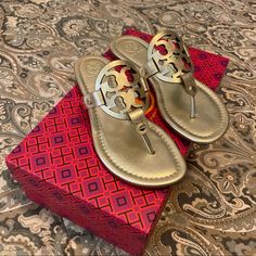 Brand New In Box, Never Worn, No Defects. Discontinued Color, Hard To Find Brand New On These Size. Tory Burch Miller Sandals. Womens Sz 5.5 Medium. Color Spark Gold Metallic. Dust Bag Included. Super Cute. Please Check You Sizing Accordingly To The Brand. Make Offers!! Luxury Gold Sandals With Cushioned Footbed, Designer Tan Sandals For Formal Occasions, Designer Tan Formal Sandals, Black Tory Burch Sandals, Camel Sandals, Sequin Sandals, Stacked Heel Sandal, Tory Burch Miller Sandals, Miller Sandal