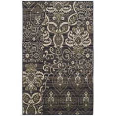 a rug with an intricate design on the front and back of it, in grey tones