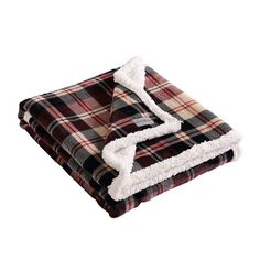 a plaid blanket with white fur trim on top and two blankets folded in the same direction