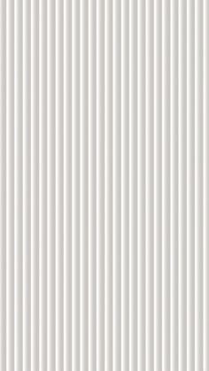 a white wall with vertical lines on it