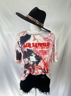 Make a statement in our vintage inspired Led Zeppelin Tie Dye Tee. It is a oversized shirt with a bold tie fye print. 95% Polyester, 5% Spandex Led Zeppelin Vintage, Distressed Jean Shorts, Distressed Denim Shorts, Vintage Tee, Good Stretches, Led Zeppelin, Zeppelin, Oversized Shirt, Vintage Tees