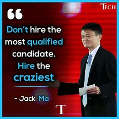 a man standing in front of a red wall with a quote on it that says don't hire the most qualified candidate hire the craziest