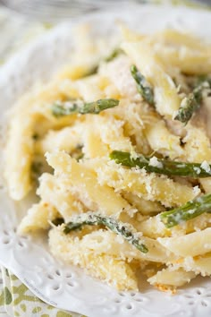 pasta with asparagus and parmesan cheese on a plate