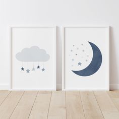 two posters with stars and clouds hanging from them on the wall next to each other