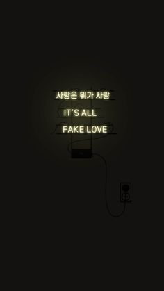 a neon sign that says it's all fake love