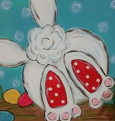 a painting of a white bunny with red polka dots on it's ears and feet