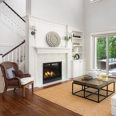 the living room is clean and ready for us to use it's new fireplace