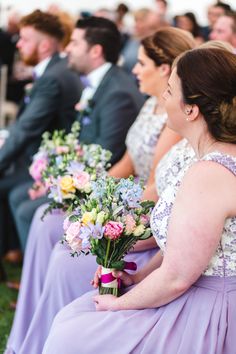 the bridesmaids are waiting for the ceremony to begin