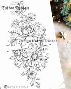 a christmas card with flowers on it and the words, tattoo again written in black ink