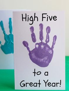 a handprinted card that says high five to a great year