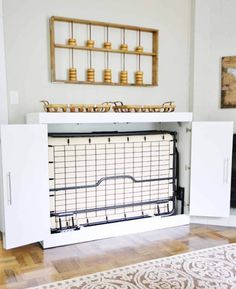 a living room with white furniture and wooden floors