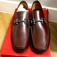 9.5d New In Box The Box Is Damaged By Moving Red Calf Leather Formal Loafers, Red Calf Leather Loafers For Formal Occasions, Luxury Red Formal Loafers, Ferragamo Shoes Mens, Black Loafers Men, Brown Suede Loafers, Logo Shoes, Black Suede Loafers, Salvatore Ferragamo Men