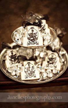 three tiered tray with candies on it