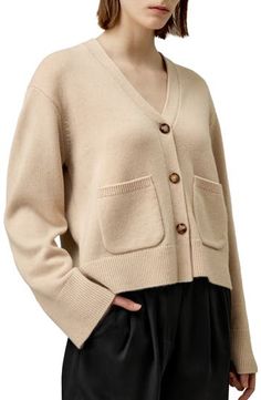 Made of 70% wool and 30% cashmere, this drop-shoulder V-neck cardigan with classic horn buttons is an essential for the autumn wardrobe. Pair it with dresses, skirts, or pants, and looks particularly elegant when paired with tall boots. 70% Wool+30% Cashmere Dropped Shoulder Sleeves Front Pockets Loose Fit Ribbed Hems Autumn Wardrobe, Sweater For Women, Cardigan Sweaters For Women, V Neck Cardigan, Tall Boots, Fall Wardrobe, Shoulder Sleeve, Cardigan Sweater, Drop Shoulder