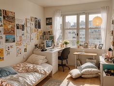 a bedroom with two beds, a desk and lots of pictures on the wall