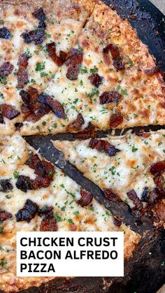 a chicken crust bacon alfredo pizza is cut into slices and sits on a black pan