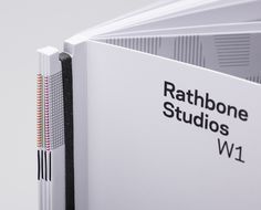 an open book with the words rathbone studios on it's front cover