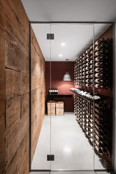 the wine cellar is filled with many bottles