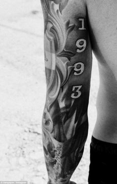 an instagram page with a man's tattoo on his arm and the number thirteen