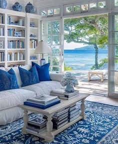 a living room with blue and white decor