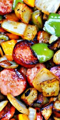 a close up view of some sausages and vegetables