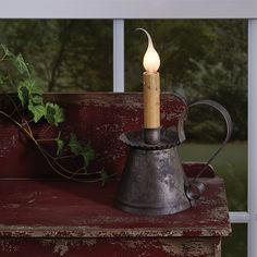 a candle that is sitting on top of a bench