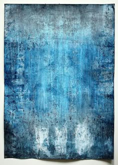 an abstract painting with blue and white colors