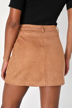 Introduce a must-have look like the Lulus A Dose of Charm Light Brown Suede High-Waisted Mini Skirt to your wardrobe to create an endless amount of iconic 'fits! Soft faux suede shapes this trendy lil' skirt that features a high-rise design with belt loops, a top button closure, and a hidden zipper fly. Front pork chop pockets accent the figure-skimming, A-line silhouette that ends at a flirty mini hem. Fit: This garment fits true to size. Length: Mid-thigh. Size medium measures 16" from waist to hem. Waist: Fitted - very fitted at natural waist. Hip: Loosely Fitted. Fabric: Fabric is very stretchy. Unlined. 92% Polyester, 8% Spandex. Hand Wash Cold. Do Not Bleach. Line Dry. Iron Low Heat. Imported. Lulus | A Dose of Charm Light Brown Suede High-Waisted Mini Skirt | Size X-Large. Belted Fitted Mini Skirt, High Waist Relaxed Mini Skirt, Chic Short Skirt In Solid Color, Chic Solid Color Mini Skirt, Chic Solid Color Skirt, Fitted Skort With Belt Loops, Chic Short Solid Color Skirt, Chic Short Length Solid Color Skirt, Trendy Relaxed Skirt In Solid Color