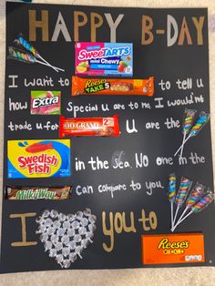 a blackboard with candy and writing on it