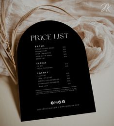 a price list on a black and white menu