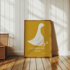 a duck is sitting on the floor in front of a wall with a quote about god's great plans