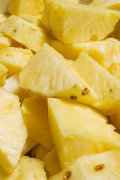 sliced pineapples in a bowl ready to be eaten