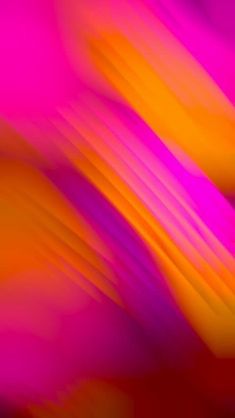 an orange and pink blurry background with some lines in the foreground, as well as other colors