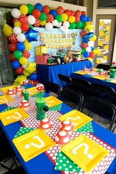 a birthday party with balloons and decorations