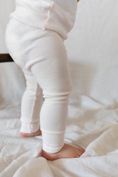 Ribbed leggings Snuggly fit ribbed leggings with cuffed legs and wide waistband Made of super soft cotton rib (Oeko-Tex certified). Match it with our snuggle top or sweatshirt for a super comfortable lounge set. Made to order in Australia. Please check our shop announcement for current turnover time.  SIZING GUIDE NB - height 52cm (20.5''), chest 39.25cm (15.5''), waist 40.75cm (16'') 0-3m - height 62cm (24''), chest 43.25cm (17''), waist 44.5cm (17.5'') 3-6m - height 68cm (27''), chest 45.75cm Blanqi Maternity Leggings, Maternity Stretch Leggings, Lycra Leggings Kids, Pregnancy Leggings, White Micro-elastic Elastane Leggings, Ribbed Leggings, Baby Leggings, Leggings Kids, Gender Neutral Baby Clothes